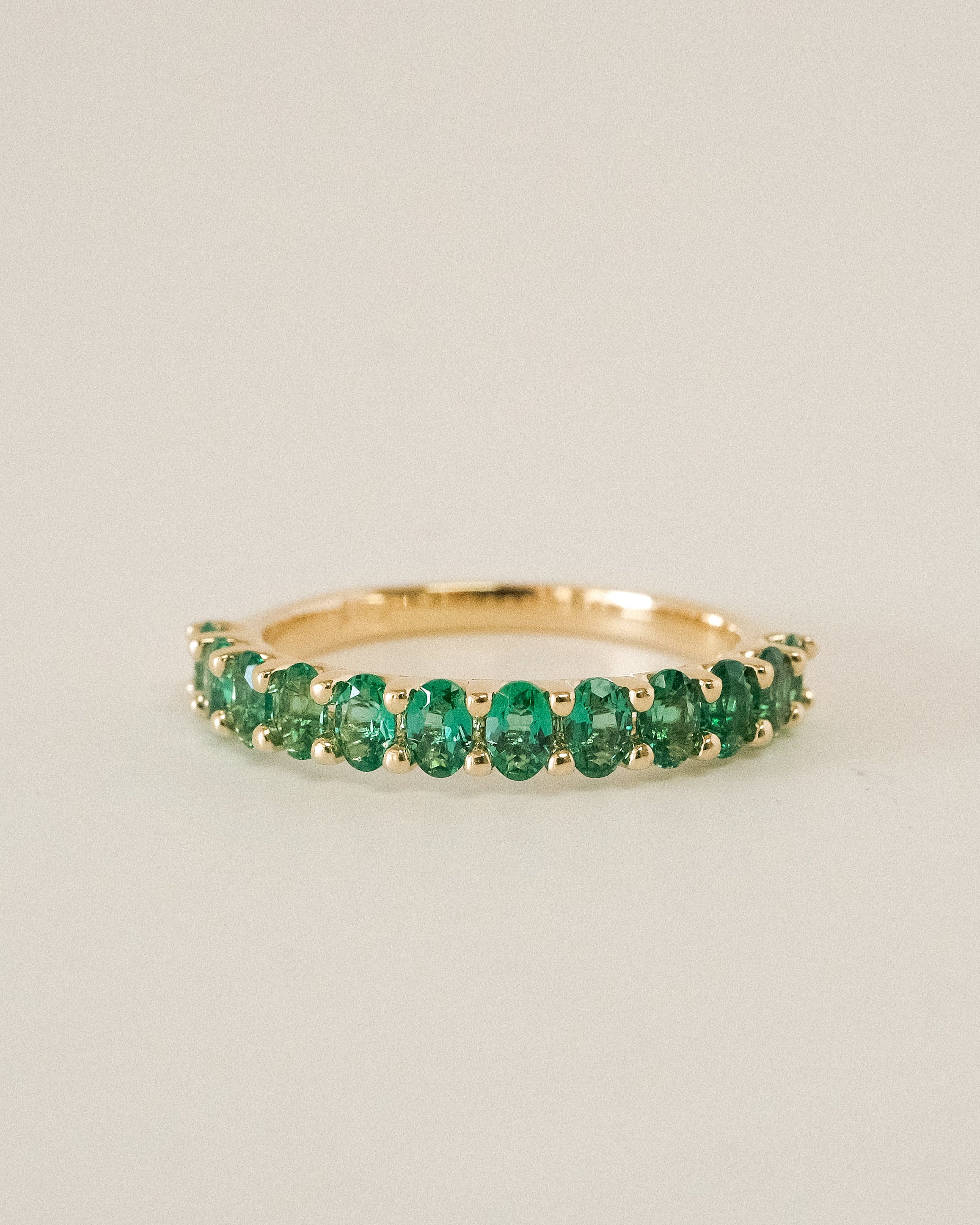 ALINA OVAL EMERALDS BAND