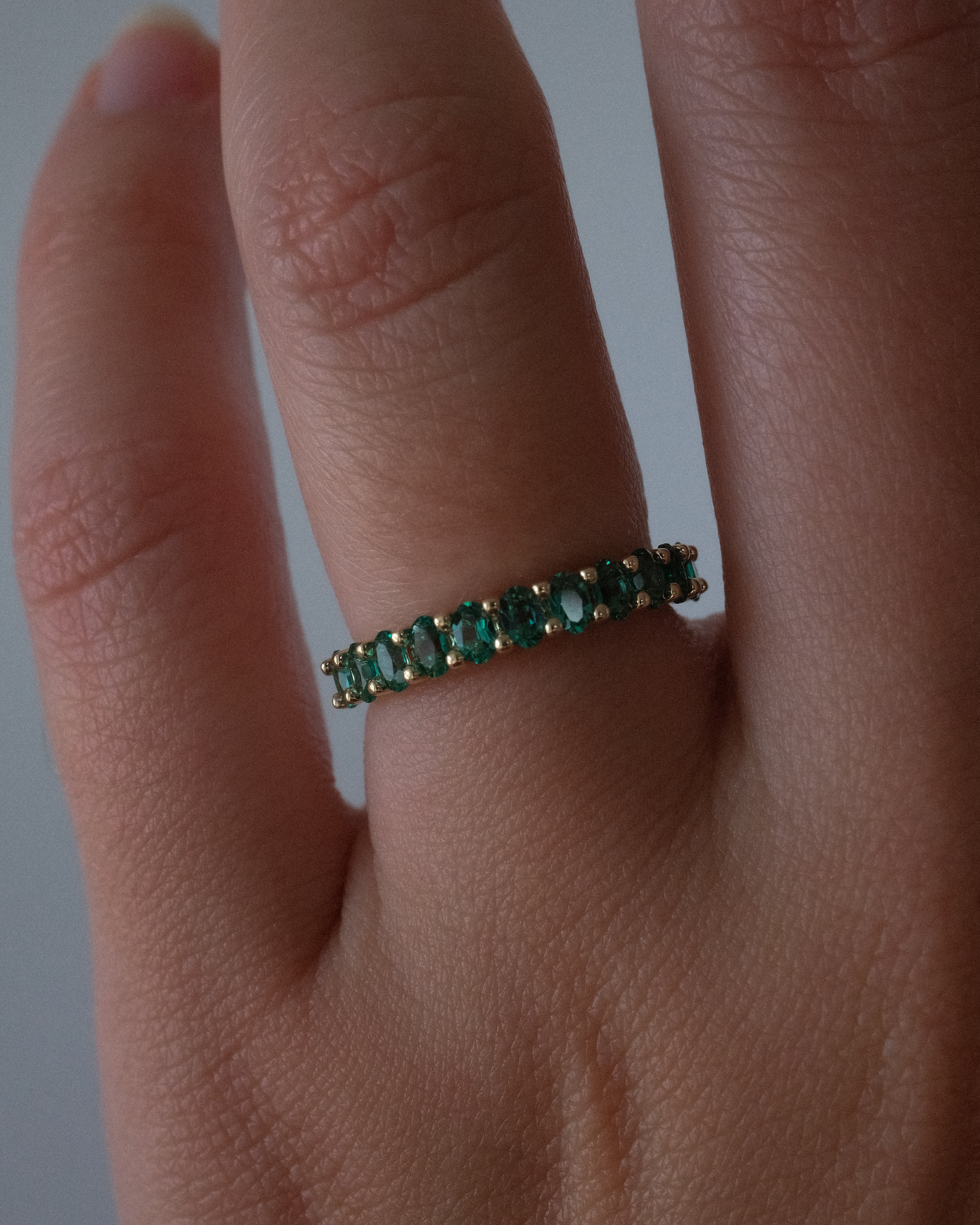 ALINA OVAL EMERALDS BAND