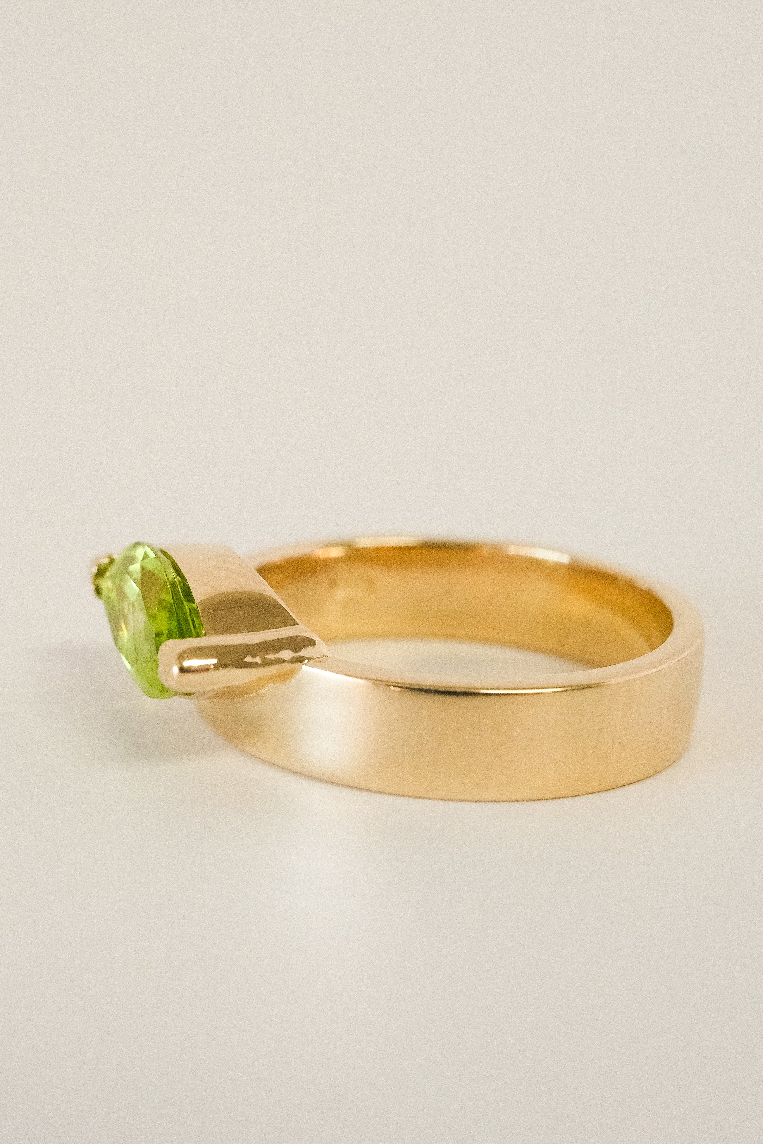 Offset Marquise Peridot Cigar Band Ring