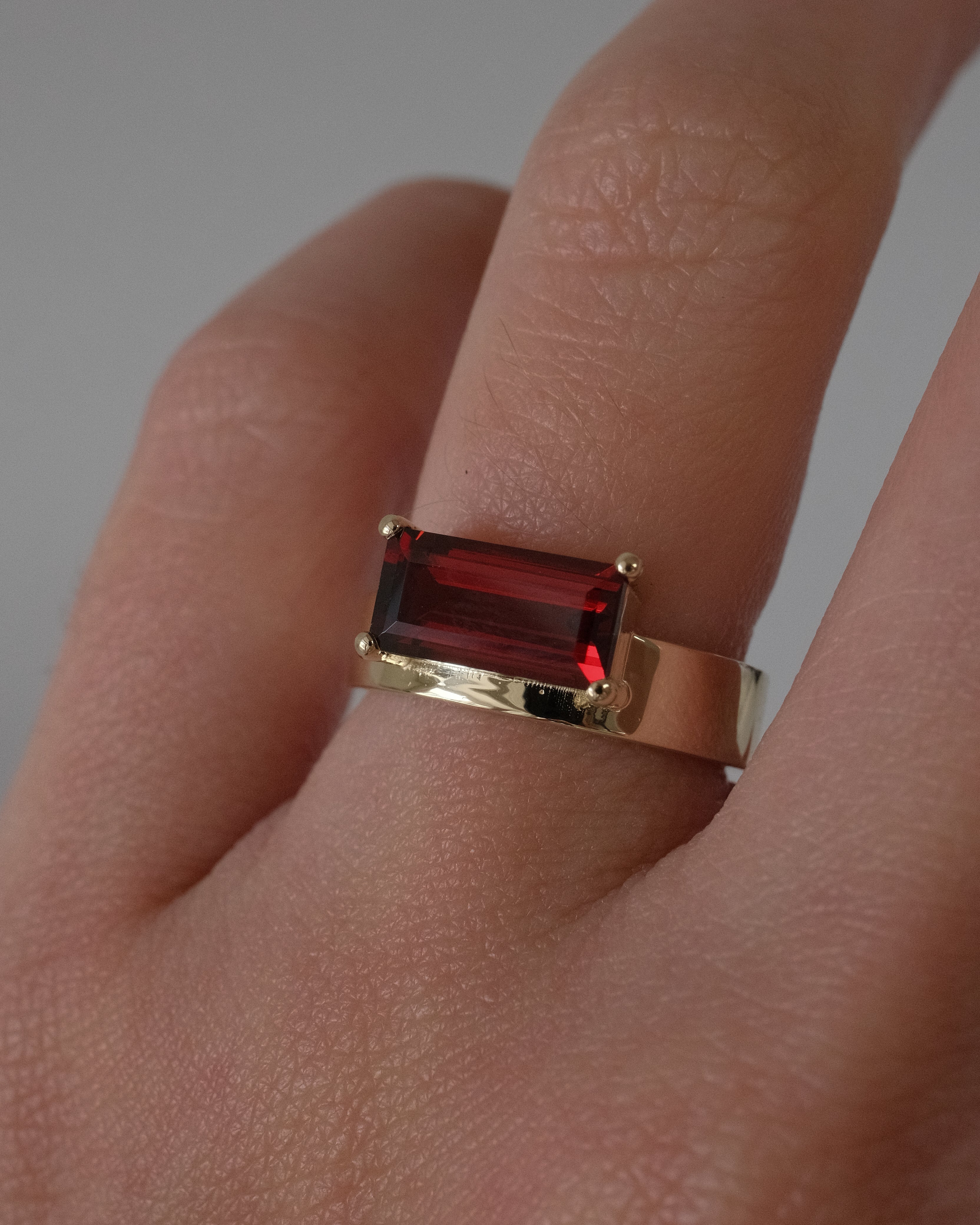 Offset Baguette Garnet Cigar Band Ring